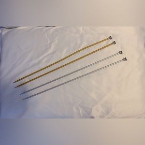 2 pairs of size 6 aluminum knitting needles.